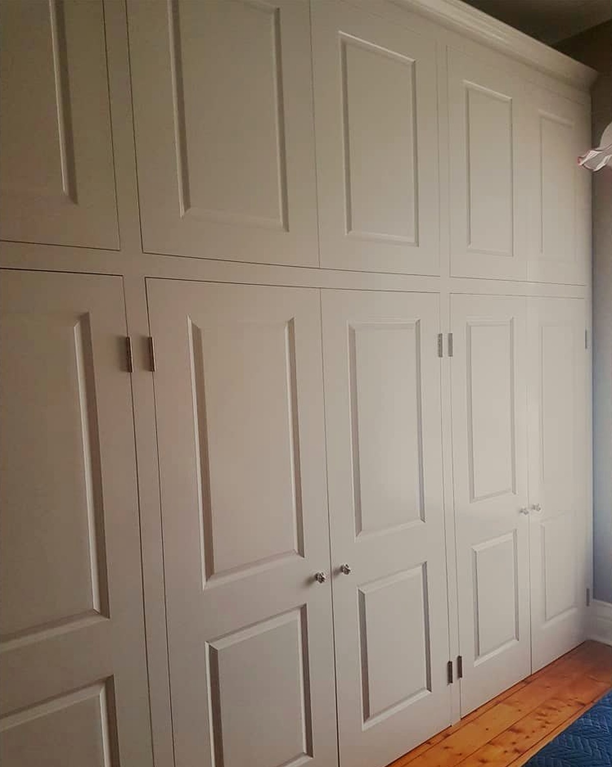 Large built-in robes with traditional panelled doors, the Lawson family home, Castlemaine