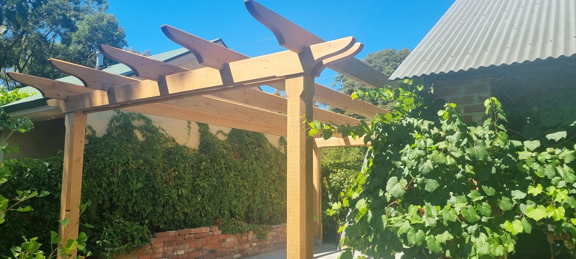 Hand-built timber pergola at the Lawson family home, Castlemaine