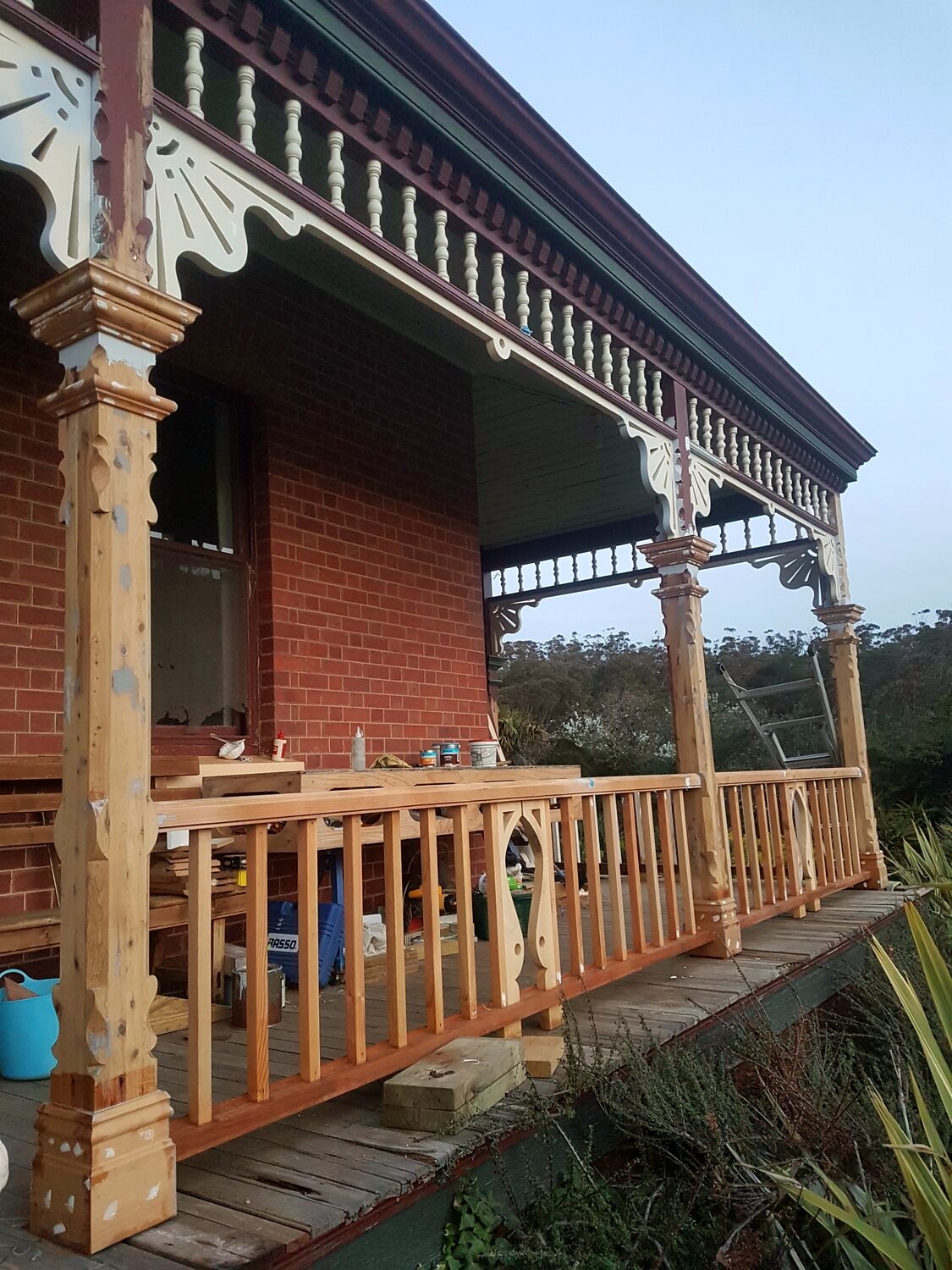 Restored verandah with turned posts and decorative timber frieze, Airlie, Castlemaine