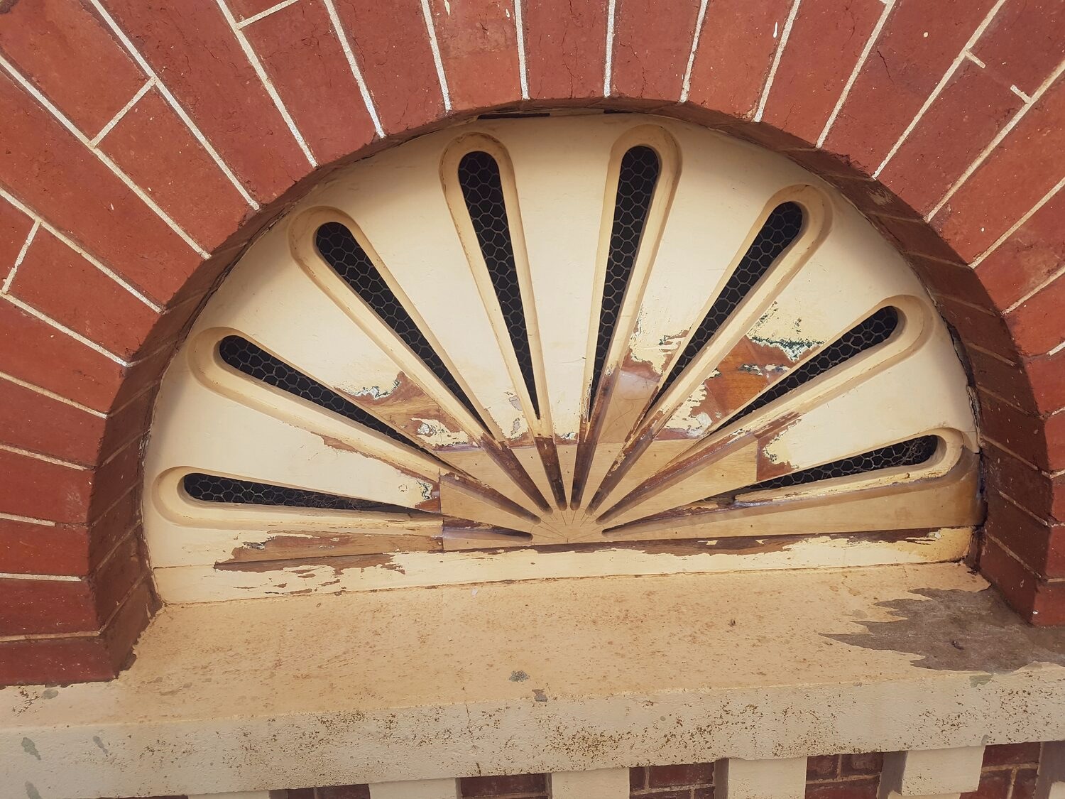 Decorative gable fan during conservation work