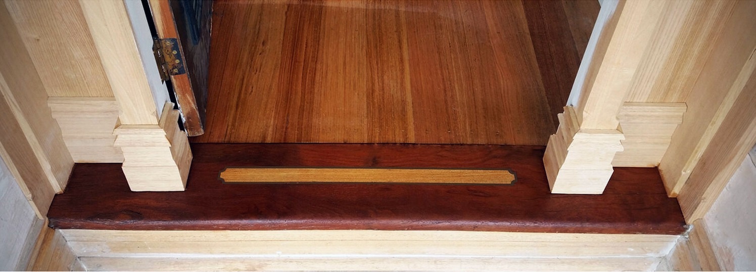 Victorian entrance sill detail, Burmese teak inlay with copper resin border