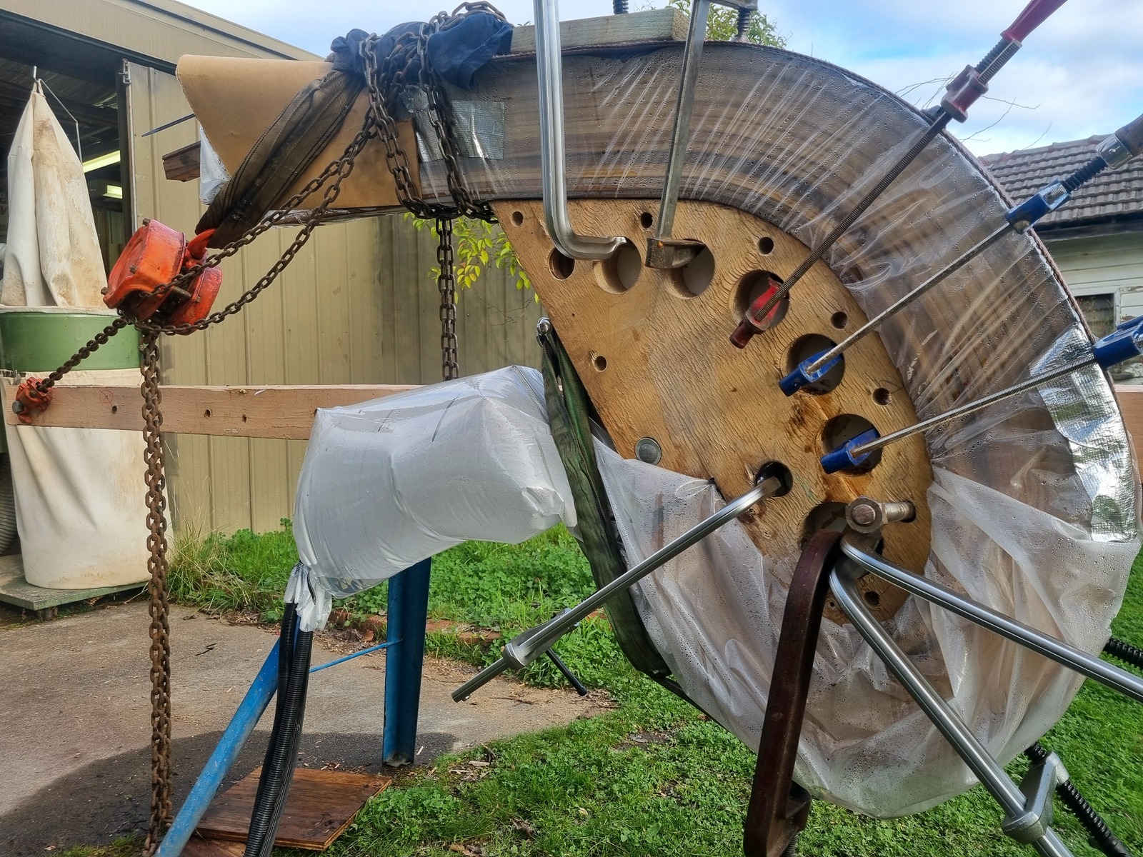 Timber being steam bent over a forming jig
